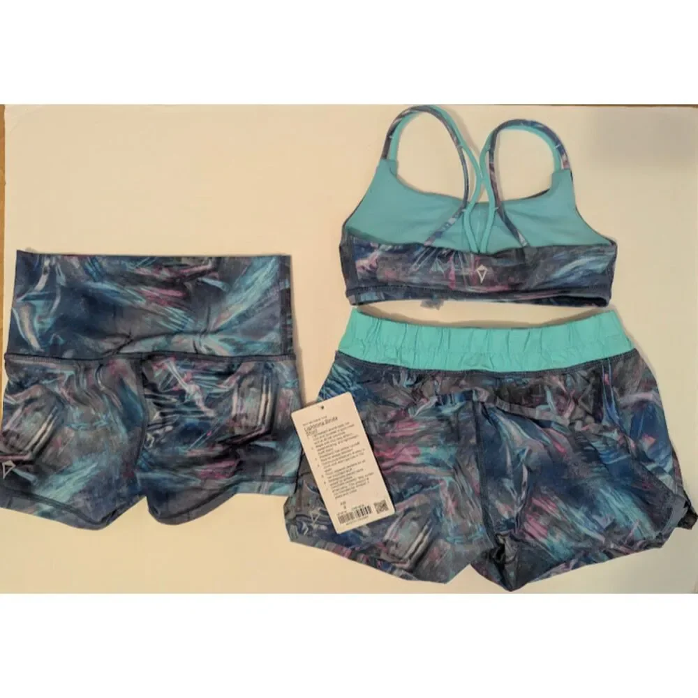 NWT / EUC Ivivva by Lululemon 3 piece blue electric set Size 8 girls bra shorts